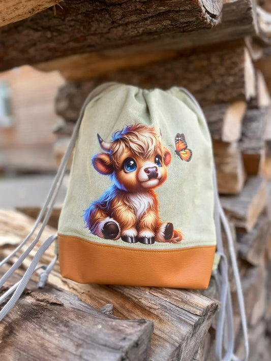 Bügelbild Highland Kuh  mit Schmetterling Fylou's Style