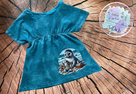 Bügelbild Robbe baut eine Sandburg #1 Fylou's Style