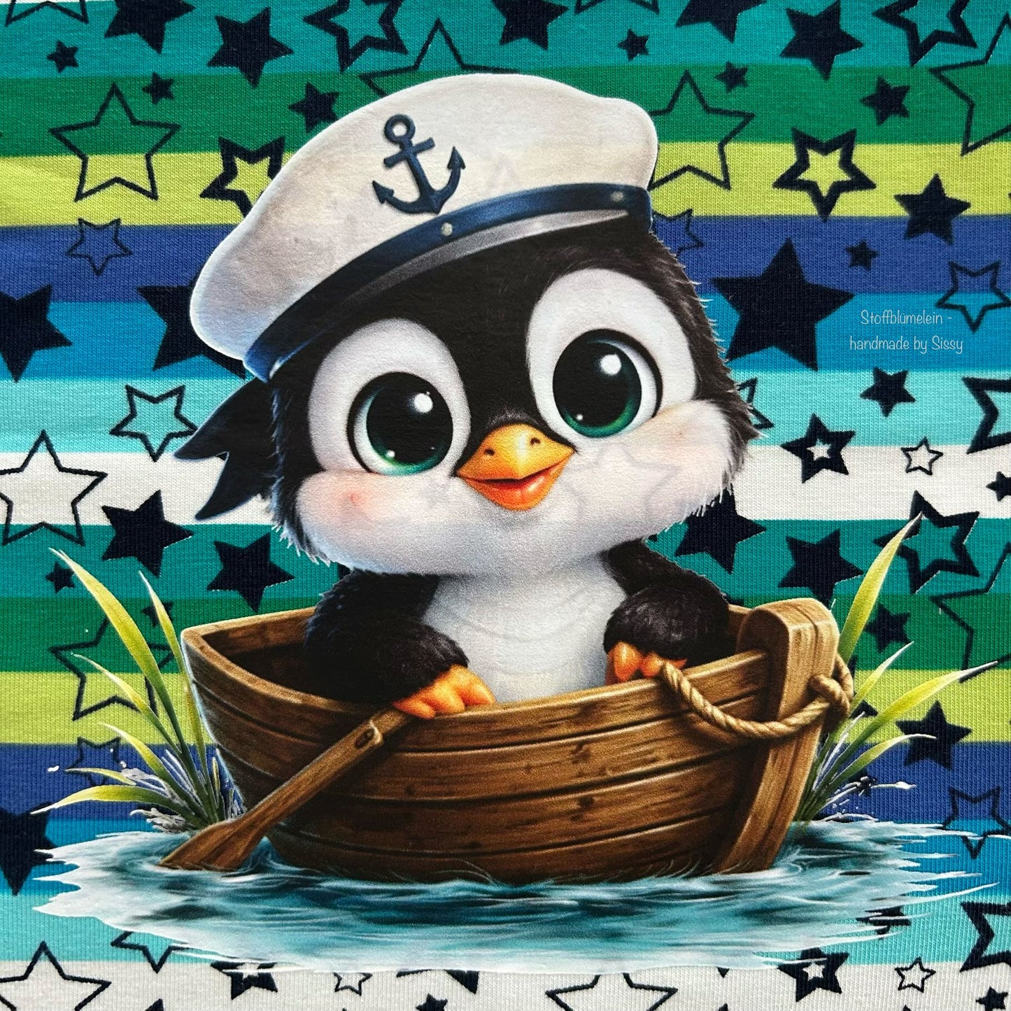 Bügelbild schwarzer Pinguin im Boot