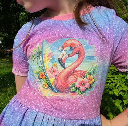 Bügelbild  Flamingo am Strand mit Surfbrett