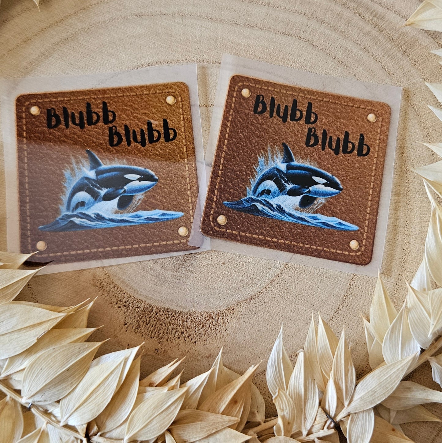 Bügellabel Orka